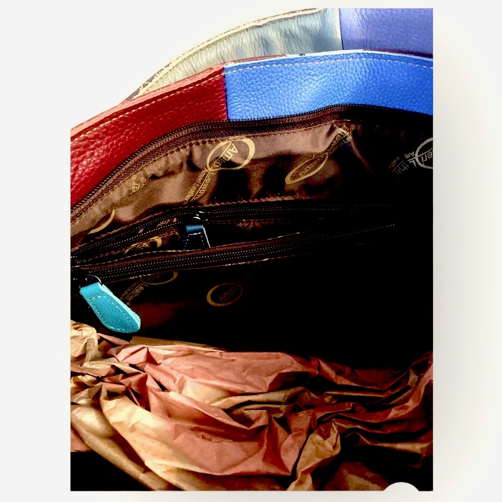 AmeriLeather Crossbody bag with tiny skull head adornments. - Picture 3 of 5